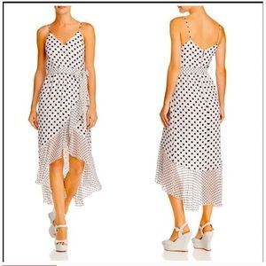 Brand: Alice + Olivia Style: Midi Type: Dress Color: White Black Size: 4